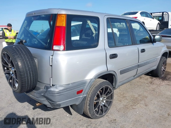 2000 Honda CR-V LX with VIN JHLRD2846YC016747, listed as a IAAI auction lot 41989951 with 163,440 mi miles. Bid and sale history available at carsss.com. Image 4.