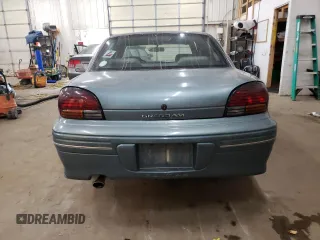 1997 Pontiac Grand Am SE with VIN 1G2NE52M8VC721326, listed as a Copart auction lot 75860034 with 110,209 mi miles and Salvage Title. Bid and sale history available at carsss.com. Image 6.