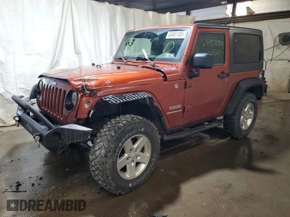 2014 Jeep Wrangler Sport with VIN 1C4AJWAG7EL197285, listed as a Copart auction lot 63451105 with 141,547 mi miles and Salvage title. Bid and sale history available at DreamBid. Image 1.