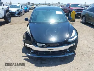 2020 Tesla Model 3 Performance z VIN 5YJ3E1EC5LF641593, wystawiony jako IAAI lot #42153291 z przebiegiem 70 264 mil mil oraz . Historia ofert i sprzedaży dostępna na DreamBid. Obrazek 13.
