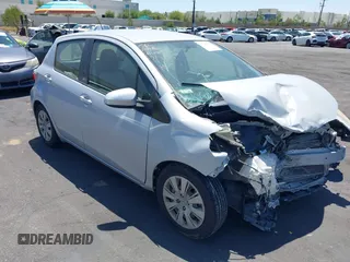 2012 Toyota Yaris L z VIN JTDKTUD3XCD533644, wystawiony jako IAAI lot #42286777 z przebiegiem 149 185 mil mil oraz . Historia ofert i sprzedaży dostępna na DreamBid. Obrazek 1.
