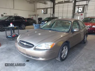 2003 Ford Taurus SE Standard with VIN 1FAFP53U13G229161, listed as a IAAI auction lot 39753697 with 94,195 mi miles. Bid and sale history available at carsss.com. Image 2.