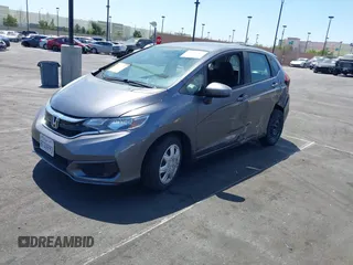 2020 Honda Fit LX with VIN 3HGGK5H44LM728355, listed as a IAAI auction lot 41986509 with 24,395 mi miles. Bid and sale history available at carsss.com. Image 2.
