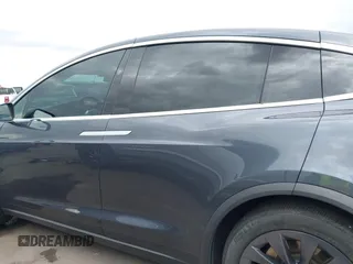 2018 Tesla Model X 75D with VIN 5YJXCBE29JF126629, listed as a IAAI auction lot 42205838 with 47,343 mi miles and . Bid and sale history available at DreamBid. Image 15.