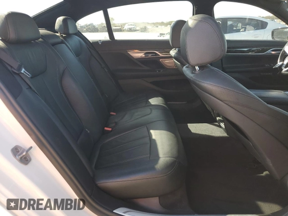 2018 BMW 7 Series 740e xDrive iPerformance with VIN WBA7J2C50JG938424, listed as a Copart auction lot 76085784 with 90,316 mi miles and Salvage Title. Bid and sale history available at carsss.com. Image 10.