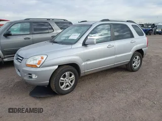 2005 Kia Sportage LX with VIN KNDJE723557070596, listed as a IAAI auction lot 42008414 with 215,204 mi miles and . Bid and sale history available at carsss.com. Image 2.