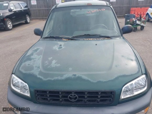 1998 Toyota RAV4 with VIN JT3GP10V5W0026814, listed as a IAAI auction lot 42003456 with 196,842 mi miles. Bid and sale history available at carsss.com. Image 6.