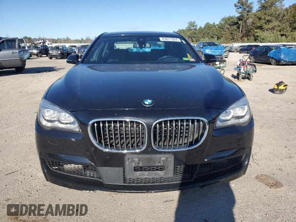 2015 BMW 7 Series 750i xDrive with VIN WBAYB6C57FD965993, listed as a Copart auction lot 83871924 with 76,720 mi miles and Salvage Title. Bid and sale history available at carsss.com. Image 5.