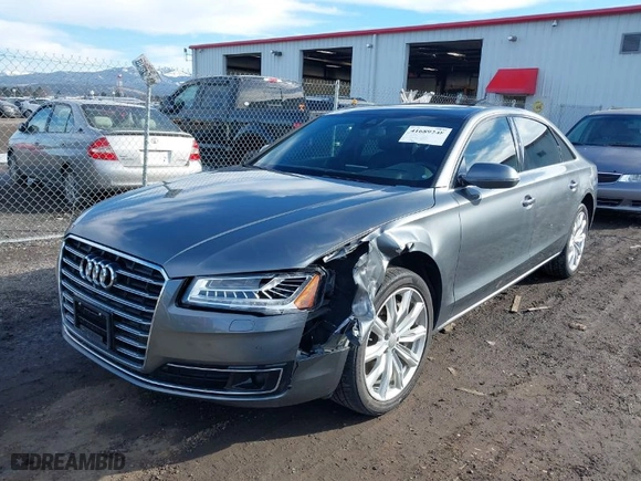 2016 Audi A8 L 3.0T with VIN WAU34AFD0GN005520, listed as a IAAI auction lot 41689248 with 76,150 mi miles. Bid and sale history available at carsss.com. Image 2.