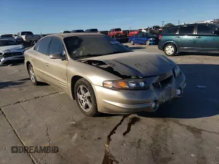 2002 Pontiac Bonneville SLE z VIN 1G2HY54K424205499, wystawiony jako Copart lot #76815334 z przebiegiem 84 715 mil mil oraz Szkoda całkowita • Salvage title. Historia ofert i sprzedaży dostępna na DreamBid. Obrazek 11.