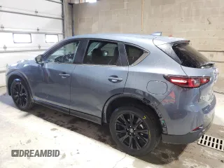 2024 Mazda CX-5 S Carbon Edition z VIN JM3KFBCL2R0528359, wystawiony jako Copart lot #58007515 z przebiegiem 20 743 mil mil oraz Tytuł czysty. Historia ofert i sprzedaży dostępna na DreamBid. Obrazek 2.