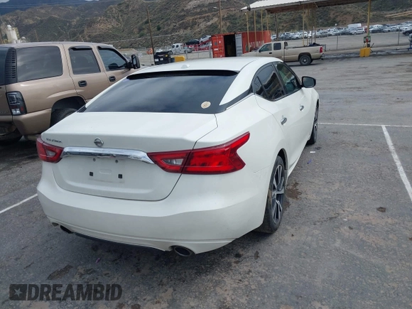 2016 Nissan Maxima SR with VIN 1N4AA6AP4GC449440, listed as a IAAI auction lot 41756271 with 136,685 mi miles and . Bid and sale history available at DreamBid. Image 4.