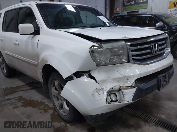 2015 Honda Pilot EX-L with VIN 5FNYF4H59FB023814, listed as a IAAI auction lot 41161235 with 216,437 mi miles and . Bid and sale history available at carsss.com. Image 6.