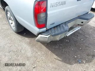 2000 Nissan Frontier XE z VIN 1N6DD26S9YC305451, wystawiony jako IAAI lot #41928123 z przebiegiem Nie podano mil oraz . Historia ofert i sprzedaży dostępna na DreamBid. Obrazek 6.
