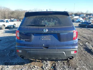 2019 Honda Passport EX-L with VIN 5FNYF7H50KB012132, listed as a IAAI auction lot 41327682 with 56,653 mi miles and . Bid and sale history available at carsss.com. Image 16.