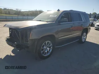 2015 GMC Yukon Denali with VIN 1GKS1CKJ2FR665259, listed as a Copart auction lot 75829894 with 193,376 mi miles and Salvage Title. Bid and sale history available at carsss.com. Image 1.