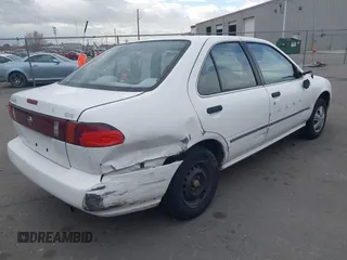 1996 Nissan Sentra XE z VIN 3N1AB41D2TL013267, wystawiony jako IAAI lot #41505728 z przebiegiem 232 387 mil mil oraz . Historia ofert i sprzedaży dostępna na DreamBid. Obrazek 4.