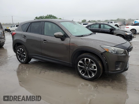 2016 Mazda CX-5 Grand Touring with VIN JM3KE2DY4G0811386, listed as a Copart auction lot 51961795 with 99,525 mi miles and Salvage Title. Bid and sale history available at carsss.com. Image 4.