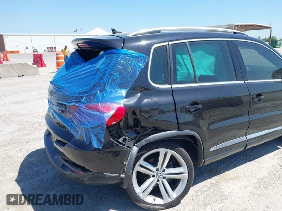 2014 Volkswagen Tiguan SEL with VIN WVGAV3AX4EW025339, listed as a IAAI auction lot 42313665 with 96,756 mi miles and . Bid and sale history available at DreamBid. Image 6.