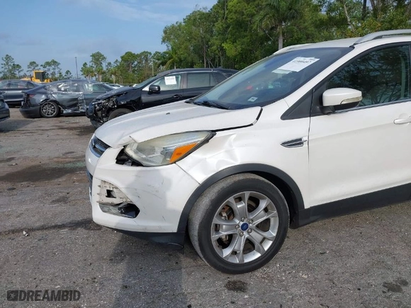 2015 Ford Escape Titanium with VIN 1FMCU0JX1FUC31418, listed as a IAAI auction lot 41900497 with 91,304 mi miles. Bid and sale history available at carsss.com. Image 6.