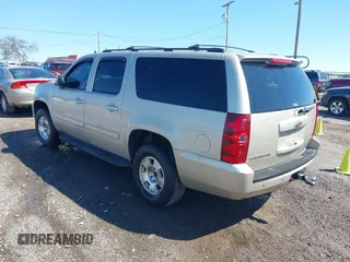 2014 Chevrolet Suburban LT with VIN 1GNSCJE07ER120130, listed as a IAAI auction lot 41792310 with 238,313 mi miles. Bid and sale history available at carsss.com. Image 3.