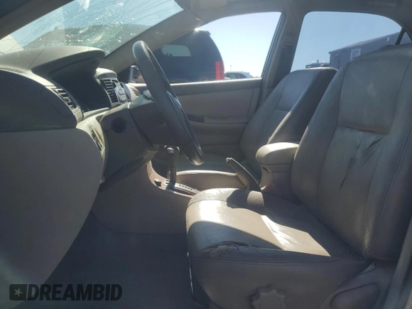 2003 Toyota Corolla CE with VIN 1NXBR38E33Z084761, listed as a Copart auction lot 55859545 with 205,938 mi miles and Salvage Title. Bid and sale history available at DreamBid. Image 7.