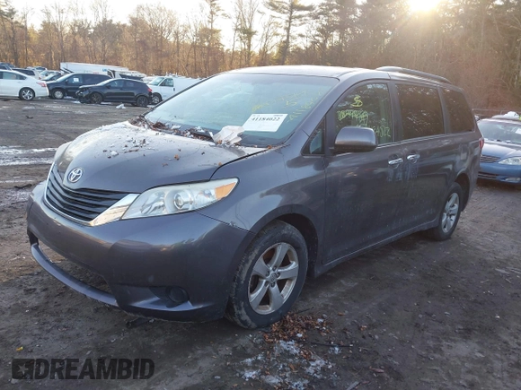 2015 Toyota Sienna LE AAS with VIN 5TDKK3DC2FS678943, listed as a IAAI auction lot 41184022 with 161,120 mi miles. Bid and sale history available at carsss.com. Image 2.