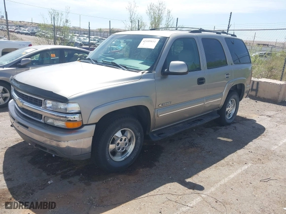 2000 Chevrolet New Tahoe LT with VIN 1GNEK13T7YJ185916, listed as a IAAI auction lot 42109831 with 205,165 mi miles. Bid and sale history available at carsss.com. Image 2.