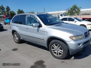 2005 BMW X5 3.0i with VIN 5UXFA13575LY00111, listed as a IAAI auction lot 42084755 with 167,167 mi miles. Bid and sale history available at carsss.com. Image 1.
