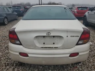 2002 Oldsmobile Aurora z VIN 1G3GS64C324168436, wystawiony jako Copart lot #84952644 z przebiegiem 152 785 mil mil oraz Tytuł czysty. Historia ofert i sprzedaży dostępna na DreamBid. Obrazek 6.