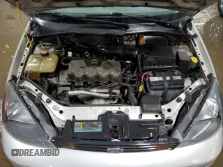 2003 Ford Focus LX z VIN 1FAFP33P03W313279, wystawiony jako Copart lot #89271495 z przebiegiem 152 672 mil mil oraz Szkoda całkowita • Salvage title. Historia ofert i sprzedaży dostępna na DreamBid. Obrazek 11.