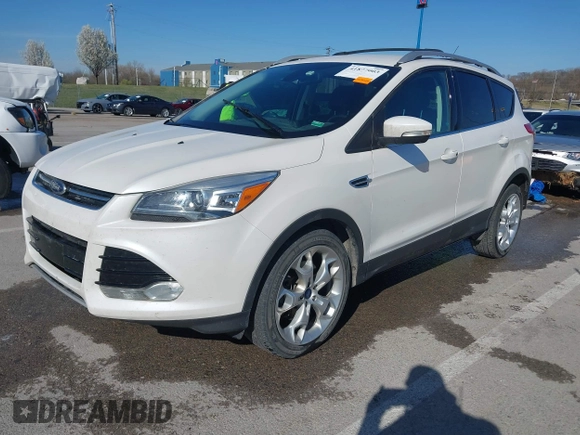 2013 Ford Escape Titanium with VIN 1FMCU0J96DUA71857, listed as a IAAI auction lot 41877003 with 118,864 mi miles and . Bid and sale history available at carsss.com. Image 2.