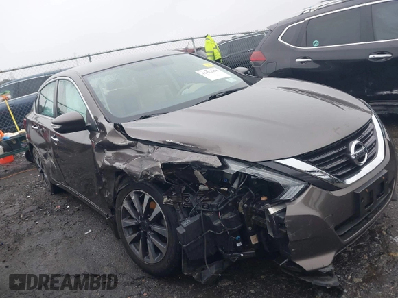 2016 Nissan Altima SV with VIN 1N4AL3AP1GC162811, listed as a IAAI auction lot 41422378 with 58,172 mi miles and . Bid and sale history available at DreamBid. Image 13.