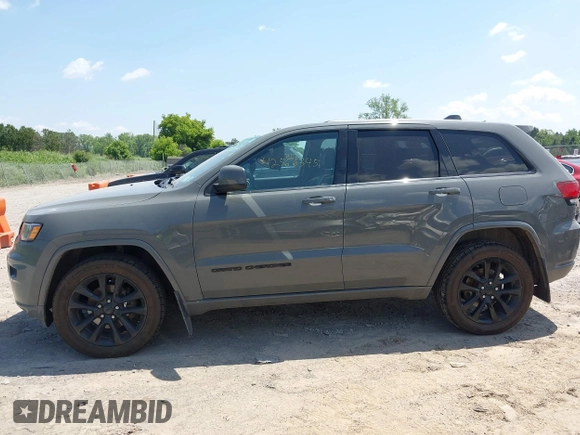 2020 Jeep Grand Cherokee Laredo E with VIN 1C4RJFAG0LC293050, listed as a IAAI auction lot 42566345 with 64,960 mi miles and . Bid and sale history available at DreamBid. Image 14.