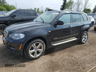2012 BMW X5 35d with VIN 5UXZW0C54CL669631, listed as a Copart auction lot 61792775 with 256,036 mi miles and Clean title. Bid and sale history available at DreamBid. Image 1.