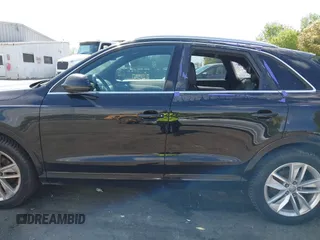 2017 Audi Q3 Premium Plus z VIN WA1JCCFS5HR001068, wystawiony jako IAAI lot #42038452 z przebiegiem 136 661 mil mil oraz . Historia ofert i sprzedaży dostępna na DreamBid. Obrazek 14.