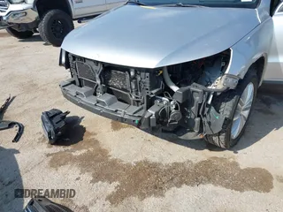 2013 Volkswagen Tiguan SE with VIN WVGAV7AX4DW545658, listed as a IAAI auction lot 41523168 with 188,729 mi miles and . Bid and sale history available at DreamBid. Image 6.