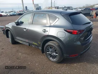 2020 Mazda CX-5 Touring with VIN JM3KFBCM8L0863951, listed as a IAAI auction lot 41921635 with 88,629 mi miles. Bid and sale history available at carsss.com. Image 3.