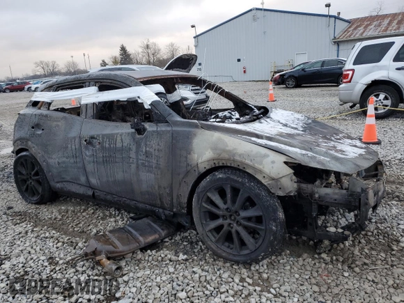 2016 Mazda CX-3 Grand Touring with VIN JM1DKDD70G0138528, listed as a Copart auction lot 81898104 with Not Provided miles and Non Repairable. Bid and sale history available at carsss.com. Image 4.