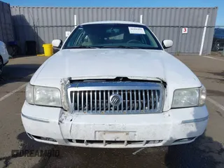2008 Mercury Grand Marquis LS z VIN 2MEFM75V68X647087, wystawiony jako IAAI lot #41936416 z przebiegiem 263 636 mil mil oraz . Historia ofert i sprzedaży dostępna na DreamBid. Obrazek 12.