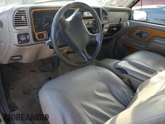 1997 GMC Sierra 1500 z VIN 2GTEK19R3V1548058, wystawiony jako Copart lot #45577845 z przebiegiem 229 738 mil mil oraz Szkoda całkowita • Salvage title. Historia ofert i sprzedaży dostępna na DreamBid. Obrazek 8.
