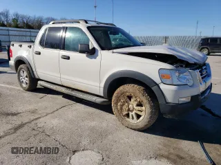 2010 Ford Explorer Sport Trac XLT z VIN 1FMEU3BE5AUA38530, wystawiony jako Copart lot #46987525 z przebiegiem 132 432 mil mil oraz Szkody całkowita. Historia ofert i sprzedaży dostępna na DreamBid. Obrazek 4.