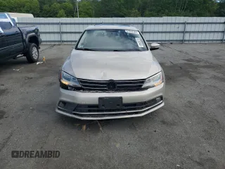 2015 Volkswagen Jetta SE z VIN 3VWD17AJ3FM232299, wystawiony jako Copart lot #57252465 z przebiegiem 128 882 mil mil oraz Szkoda całkowita • Salvage title. Historia ofert i sprzedaży dostępna na DreamBid. Obrazek 5.