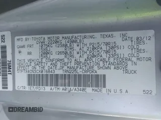 2012 Toyota Tacoma with VIN 5TFTX4CN3CX016843, listed as a IAAI auction lot 41359541 with 94,192 mi miles and . Bid and sale history available at DreamBid. Image 9.