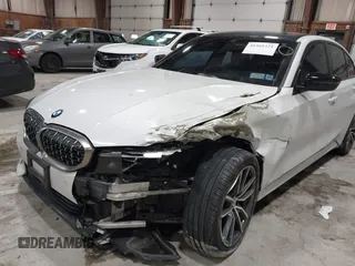 2019 BMW 3 Series 330i xDrive with VIN WBA5R7C55KAJ83482, listed as a IAAI auction lot 41565321 with 126,536 mi miles. Bid and sale history available at carsss.com. Image 6.