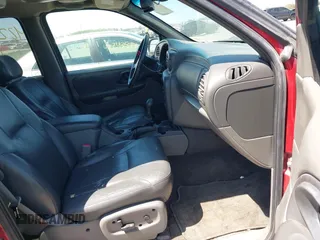 2003 Chevrolet TrailBlazer EXT LT with VIN 1GNET16SX36116391, listed as a IAAI auction lot 42243347 with 148,499 mi miles and . Bid and sale history available at DreamBid. Image 5.
