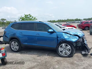 2019 Volkswagen Atlas SE z VIN 1V2WR2CA5KC524650, wystawiony jako IAAI lot #42217791 z przebiegiem 92 571 mil mil oraz . Historia ofert i sprzedaży dostępna na DreamBid. Obrazek 12.
