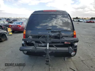 2003 GMC Envoy SLT with VIN 1GKES16SX36220489, listed as a Copart auction lot 71859834 with 148,811 mi miles and Salvage Title. Bid and sale history available at DreamBid. Image 6.
