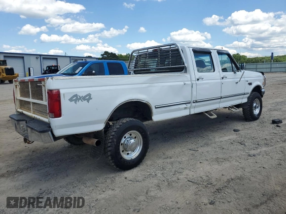 1997 Ford F-350 с VIN 1FTJW36F5VEA76761, выставлен на аукционе Copart как лот 56678865 с пробегом 156 329 миль миль и Чистый • Clean title. История ставок и продаж доступна на DreamBid. Изображение 3.
