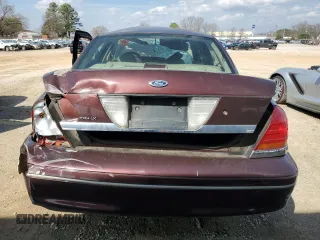 2001 Ford Crown Victoria LX z VIN 2FAFP74W31X189359, wystawiony jako Copart lot #49348255 z przebiegiem Nie podano mil oraz Nie do naprawy. Historia ofert i sprzedaży dostępna na DreamBid. Obrazek 6.